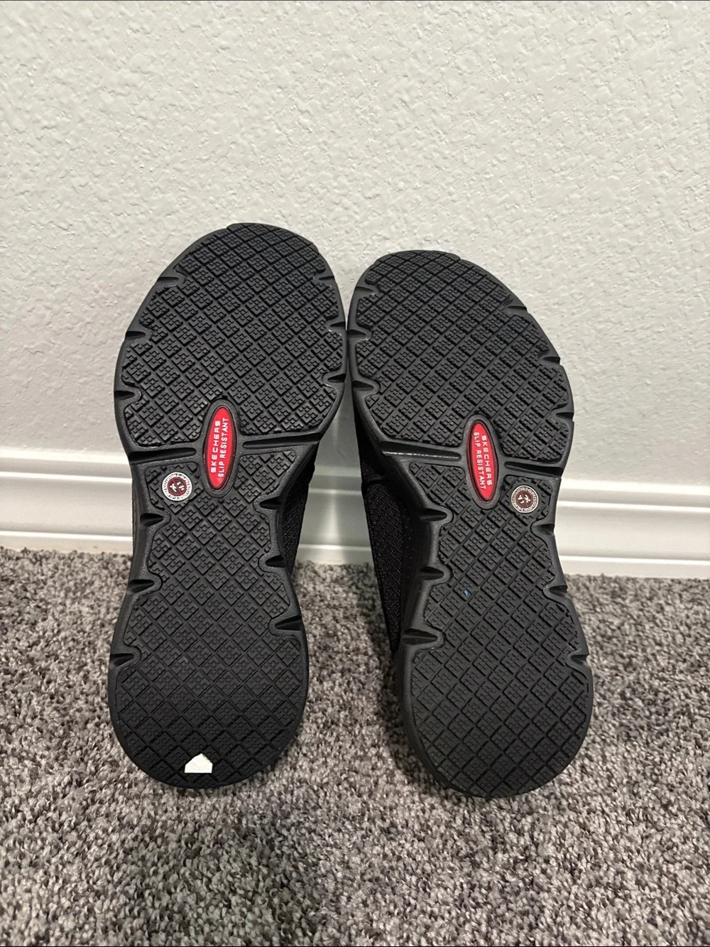 Skechers Men’s Black Slip-On Casual Loafers with Red Insole Accent